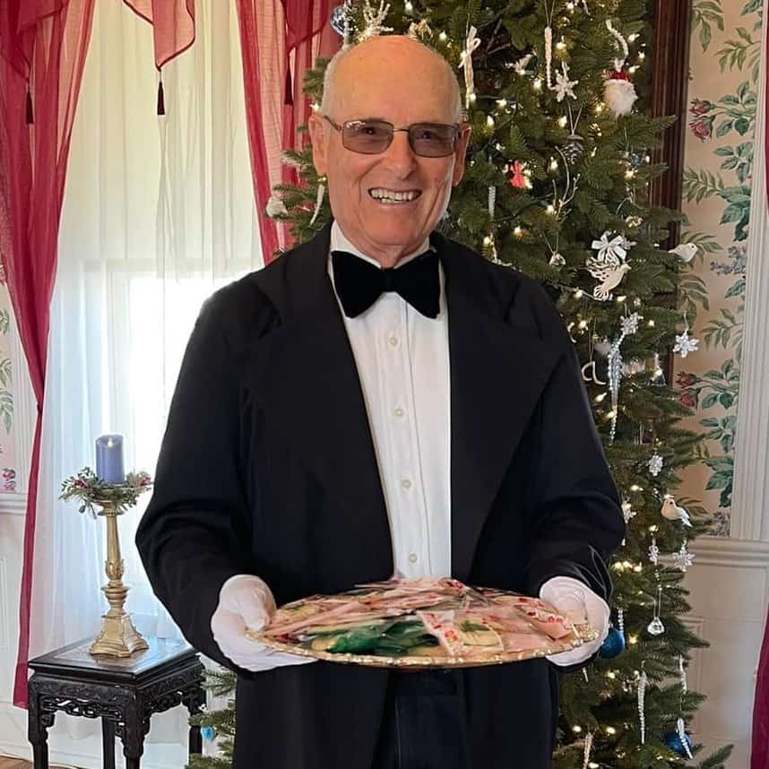 John Barry as the Butler volunteering at the Schowengerdt House