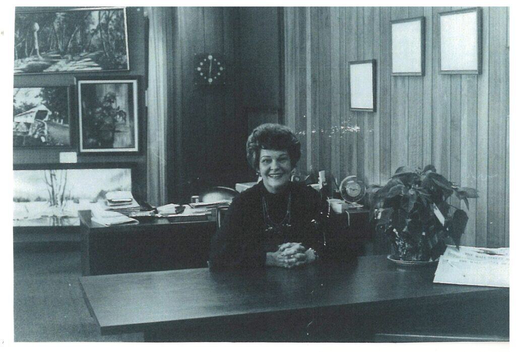 Nellie Jewel Owens Ruge at her desk, circa 1970s