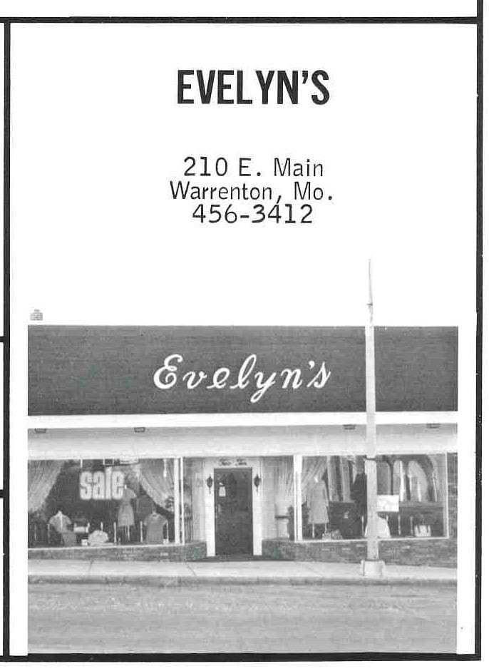 Yearbook ad showing the storefront of Evelyn's at 210 E. Main in Warrenton, Missouri, with a script sign above display windows of dresses and a sale banner.