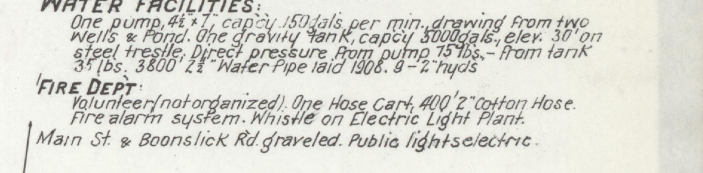 Hand-lettered 1909 Sanborn map note on Warrenton water facilities and fire department, ending with Main St. and Boonslick Rd. graveled, public lights electric.